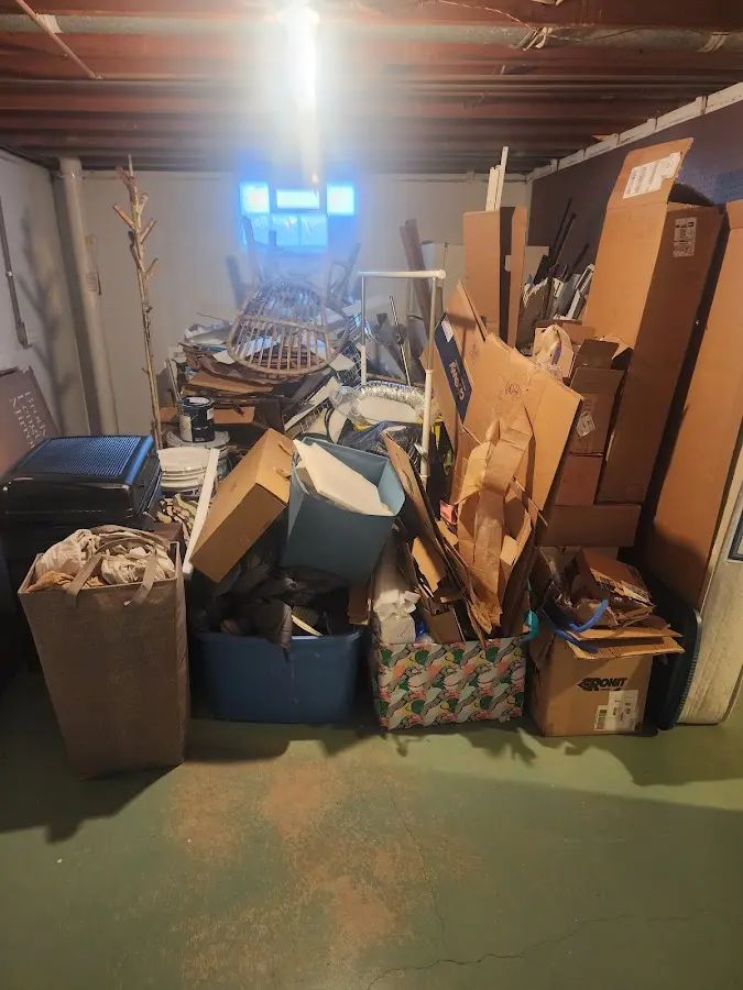 Roll-off dumpster container at job site for 4 Yard Dumpster Rental in Crossett